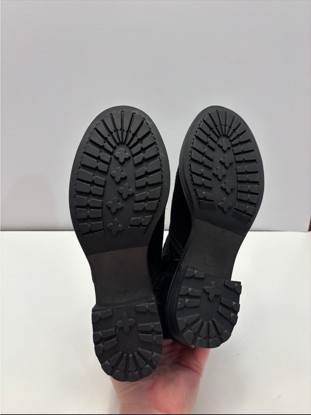 Tory Burch black suede Eloise flat booties with a prominent gold-tone metal logo - Picture 10 of 12